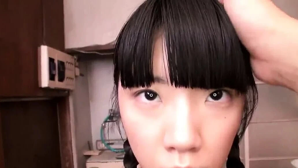 Tiny Japanese teen squirts during bukkake